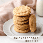 A stack of snickerdoodle cookies on a white plate.