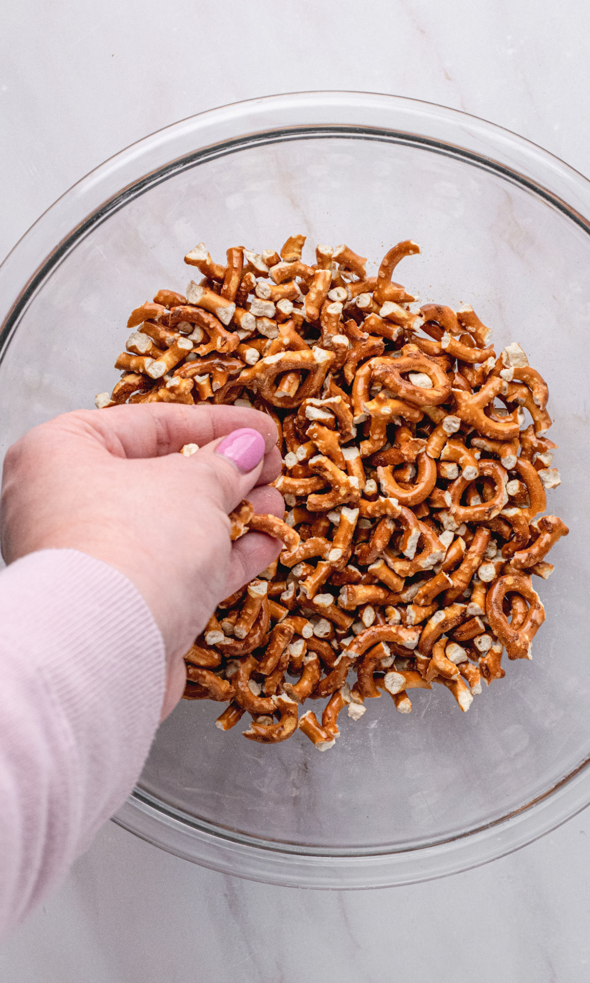 A bowl of broken up pretzels.