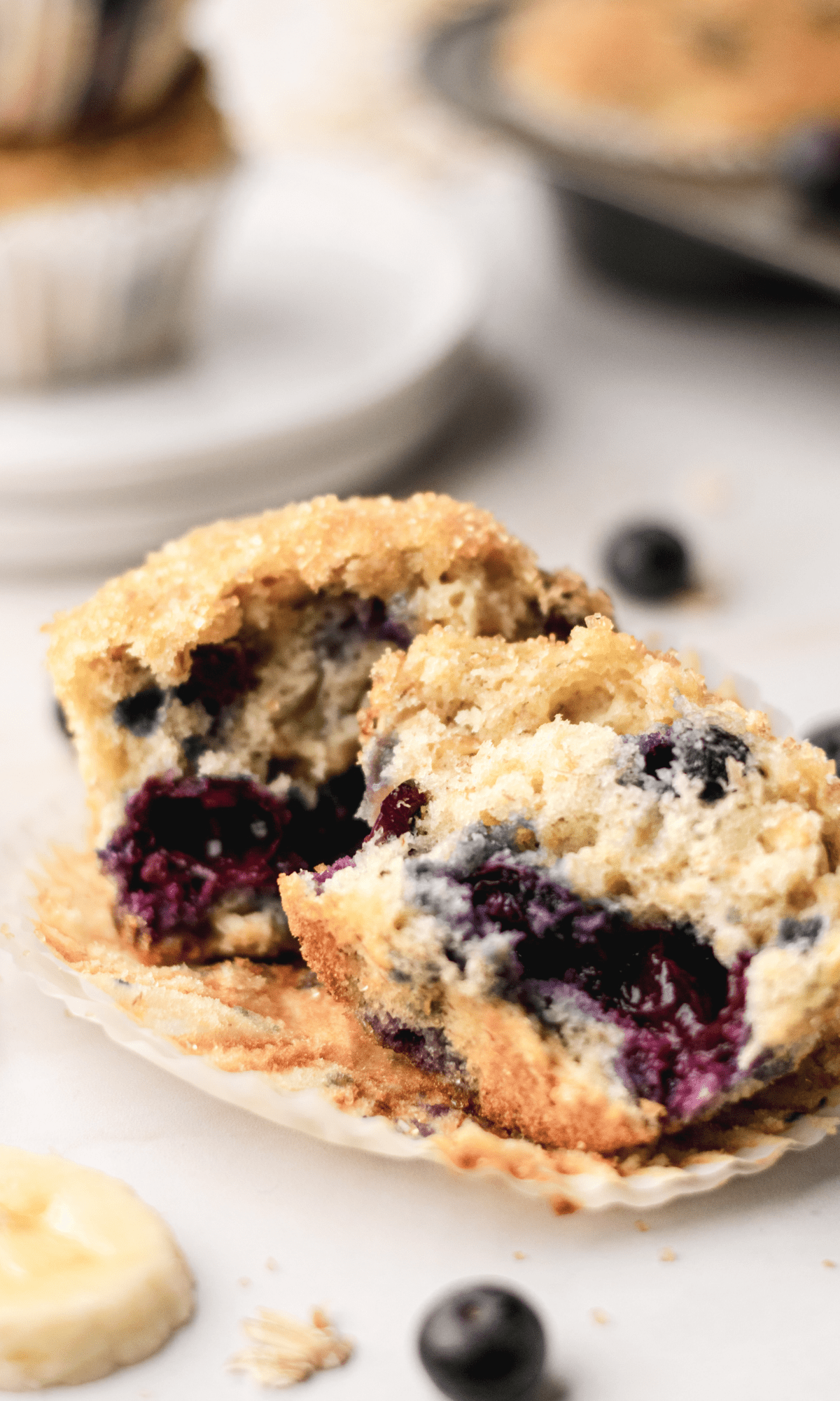 Halved oatmeal blueberry banana muffin.