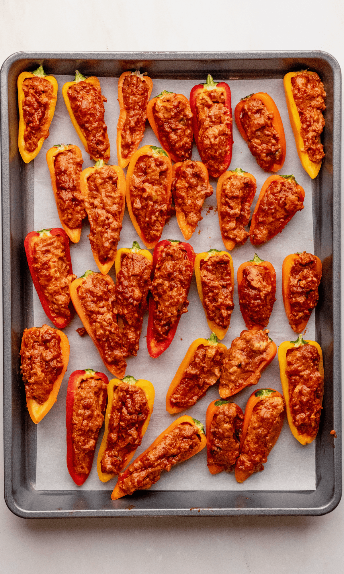 Overhead shot of Mini Bell Pepper Nachos prep.