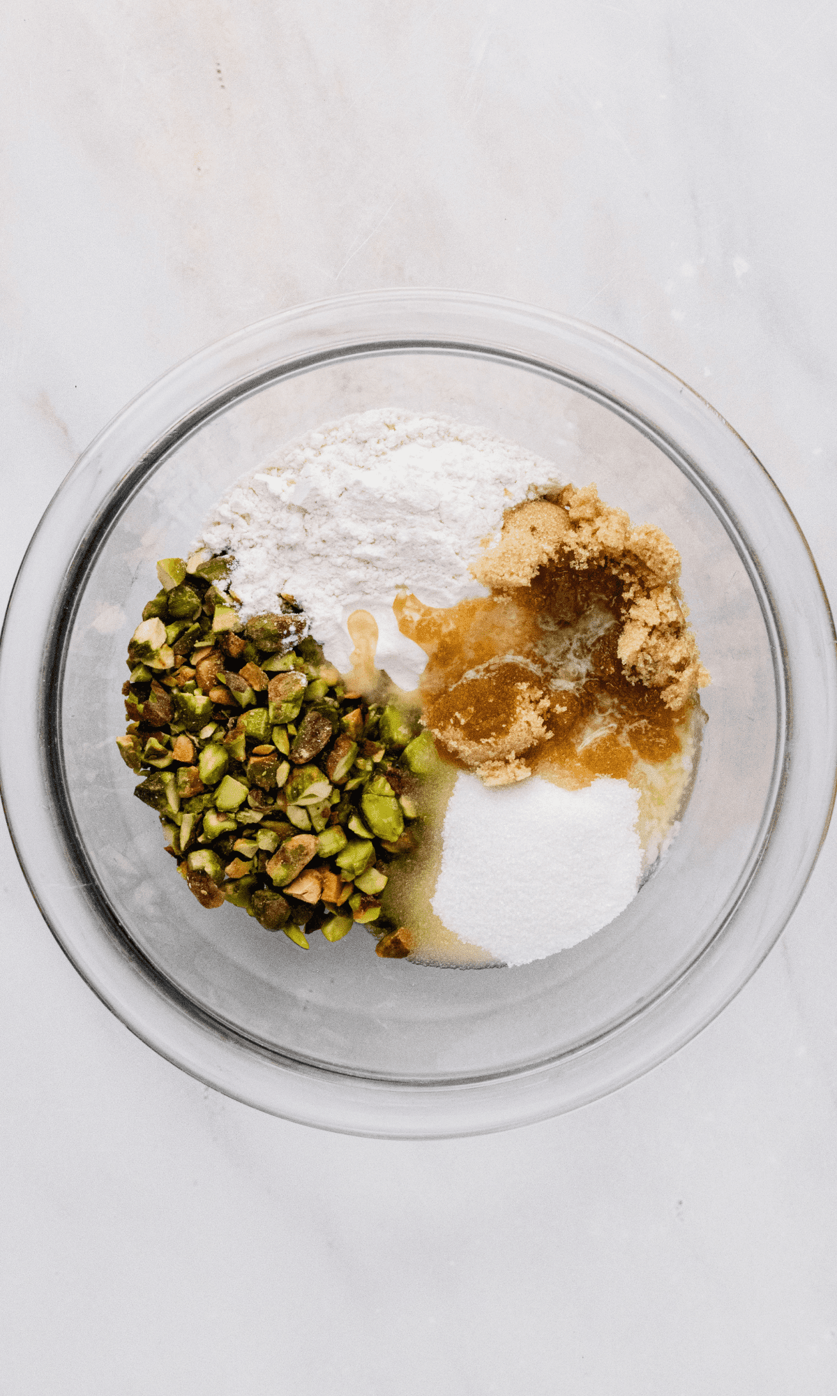 Overhead shot of pistachio crumble ingredients prior to mixing together.