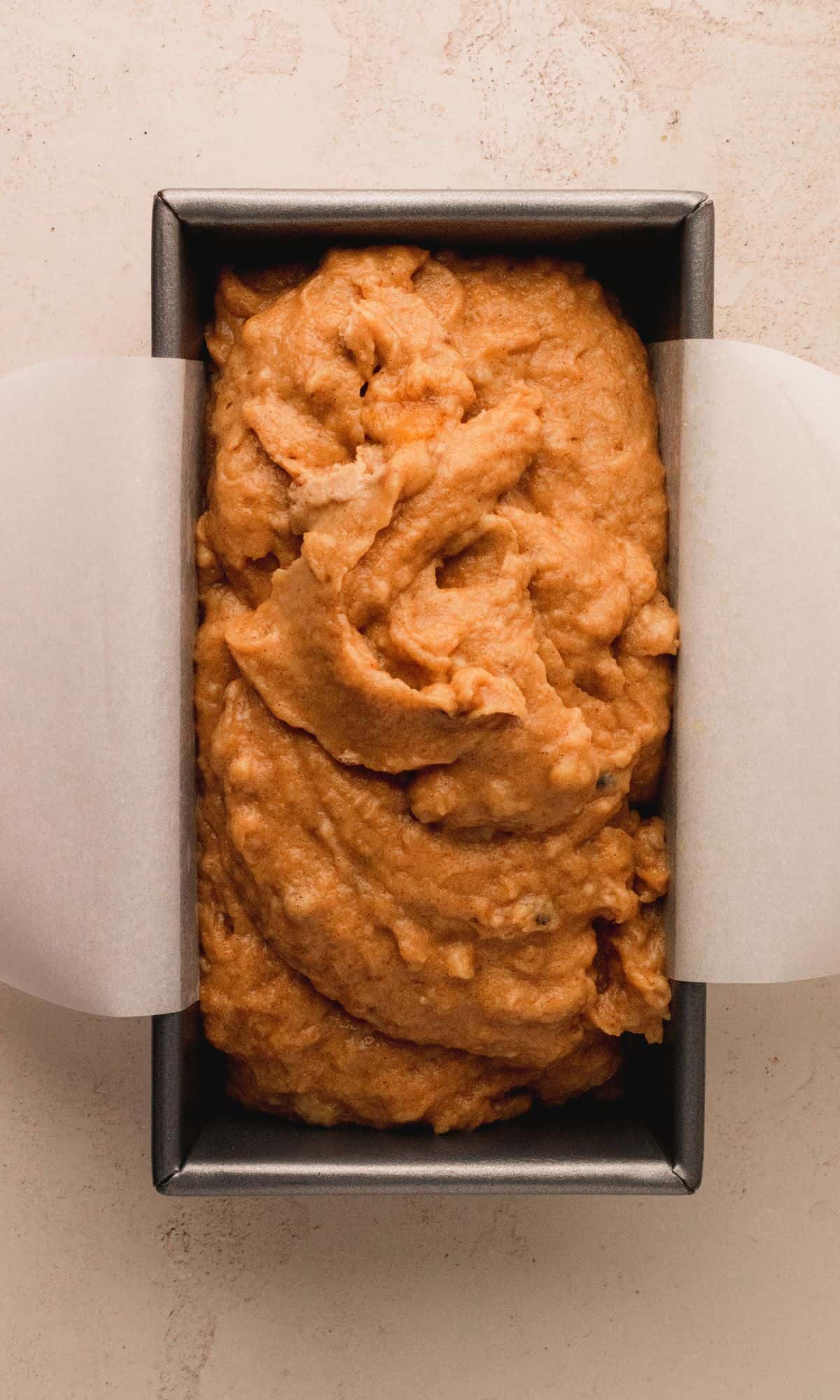 Pumpkin banana bread in loaf pan before baking.