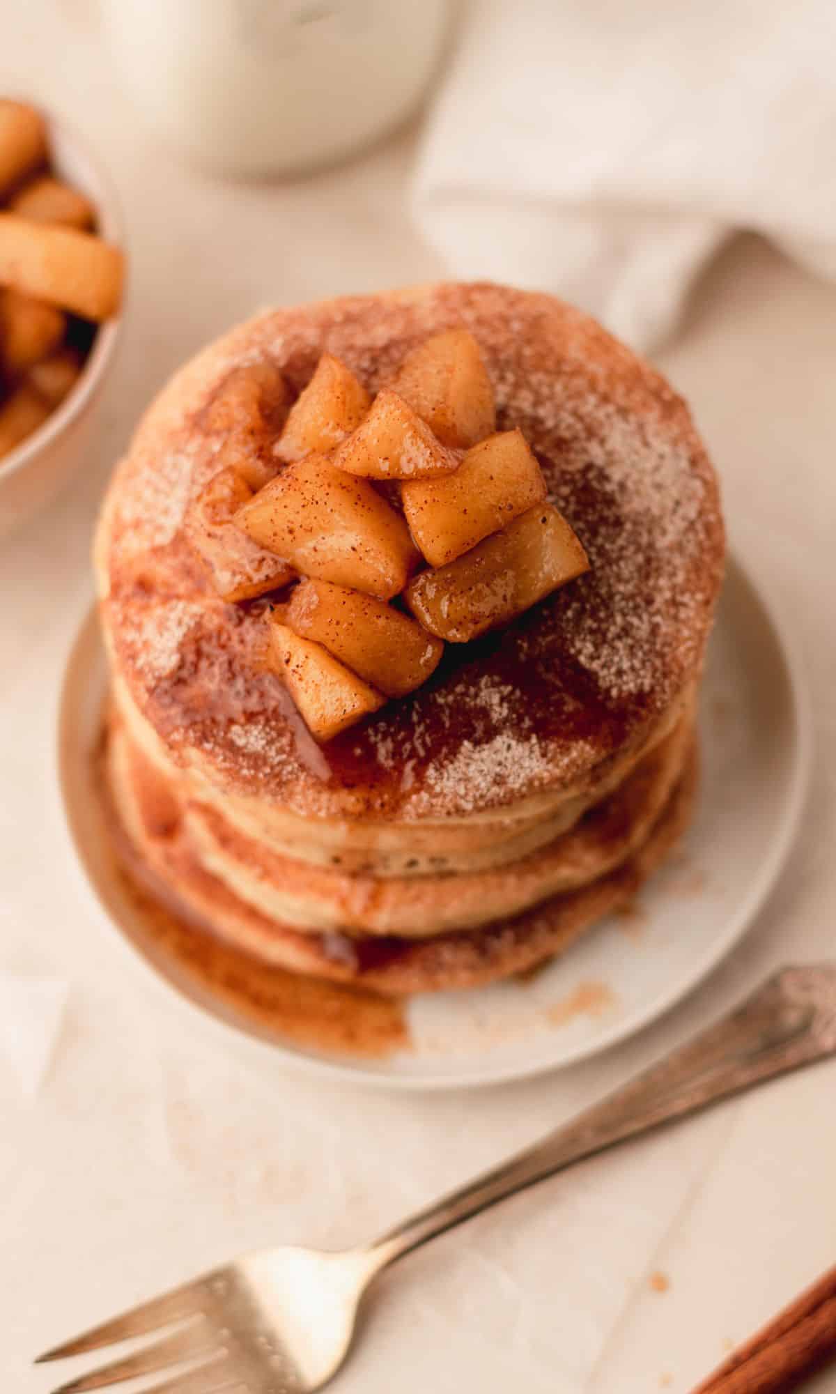 A stack of apple cider pancakes.