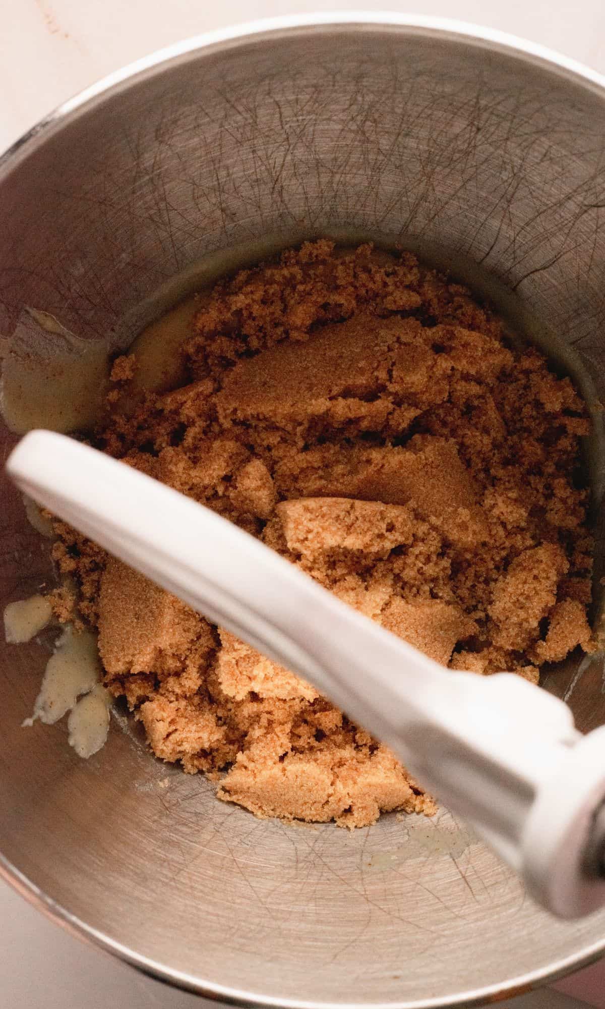 Brown butter brown sugar cookie preparation in mixing bowl.