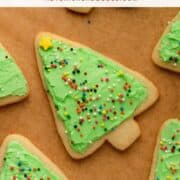 Frosted Christmas tree cookies with sprinkles.