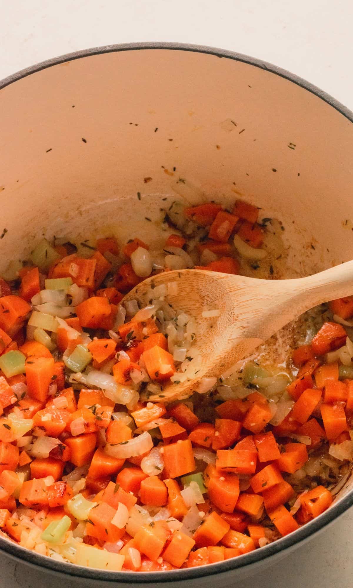 Chicken orzo soup preparation.