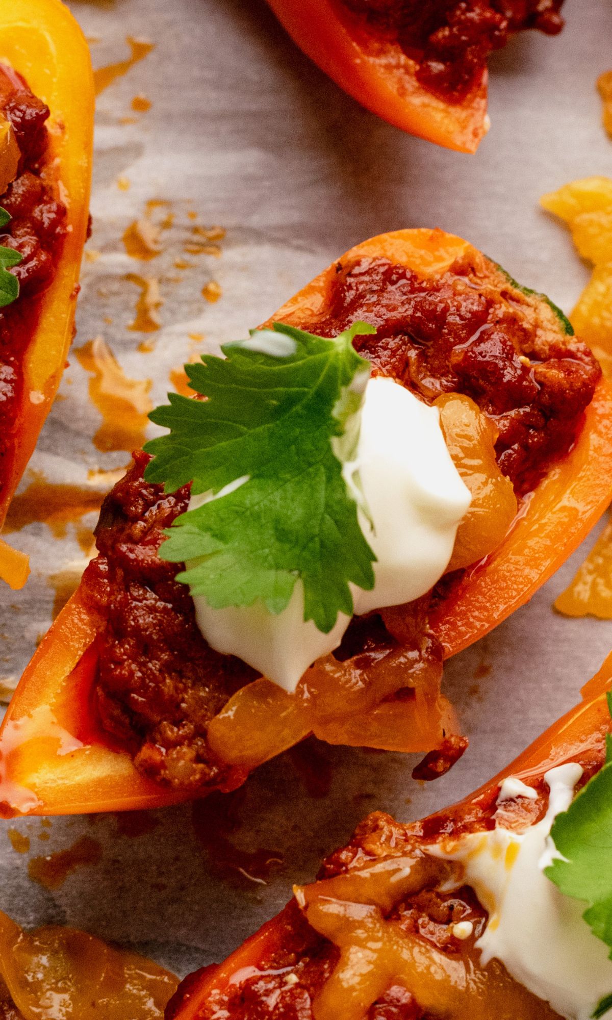 One bell pepper nacho on baking sheet.