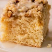 A piece of cake on a white plate.