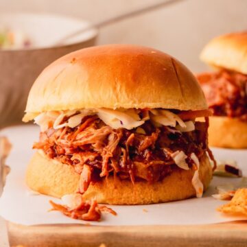 A pulled pork sandwich on a bun.
