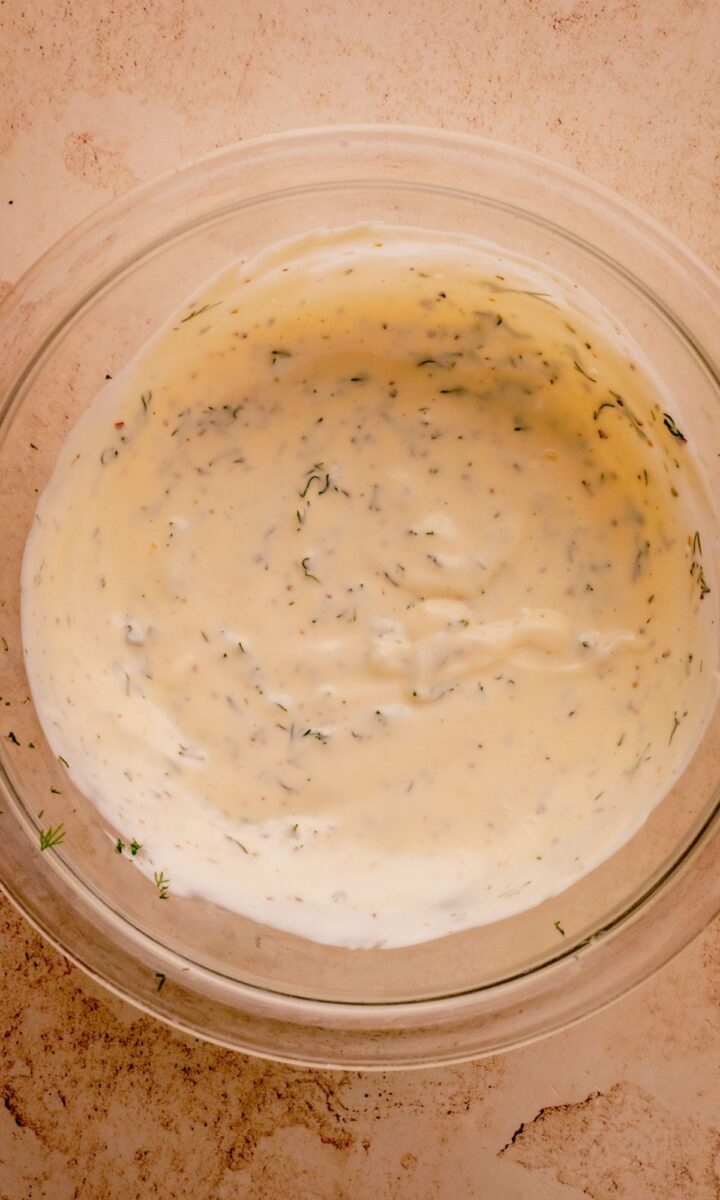 Dressing in a glass bowl.