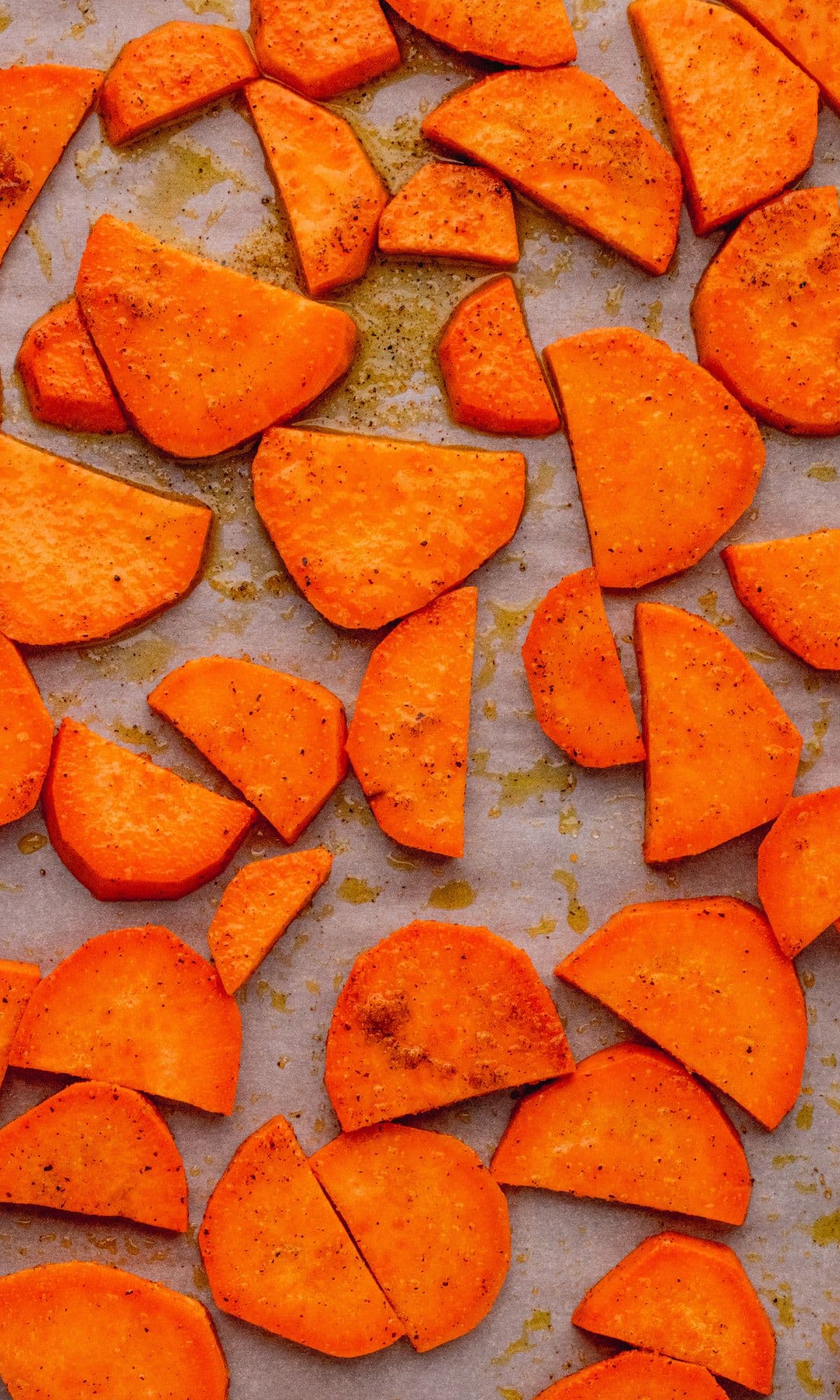 Sweet potatoes on a baking sheet.