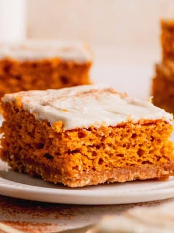 A pumpkin bar on a white plate.