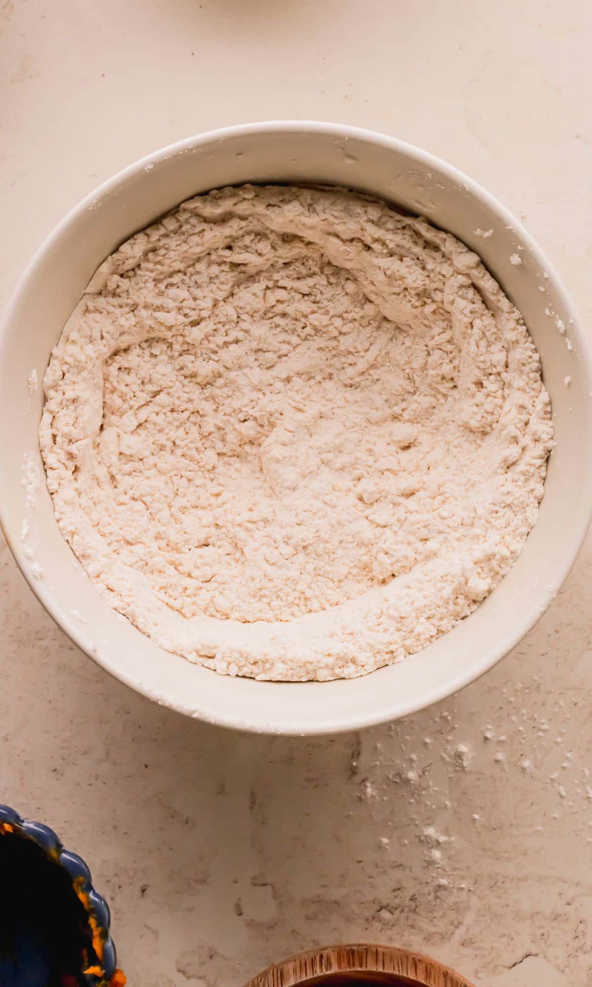 Pumpkin blondies dry ingredients mixed in a bowl.