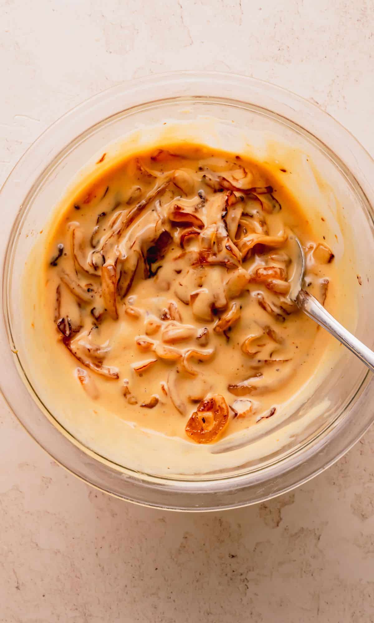 Onions mixed into honey mustard sauce.