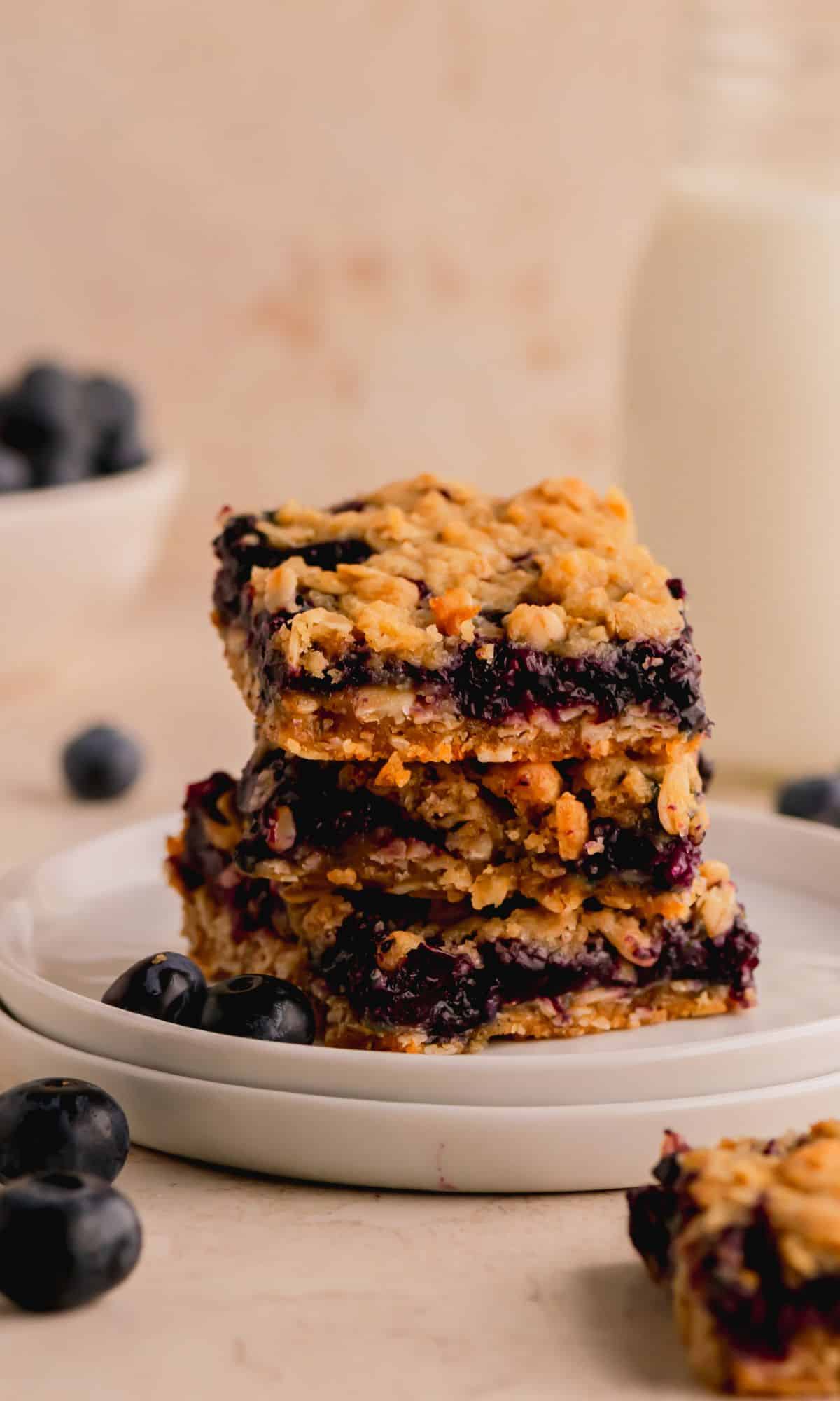 A stack of three blueberry oat bars.